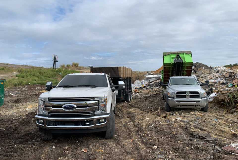 Trucks at trash dump